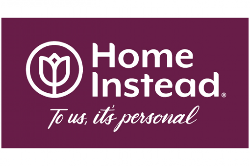 Home Instead logo